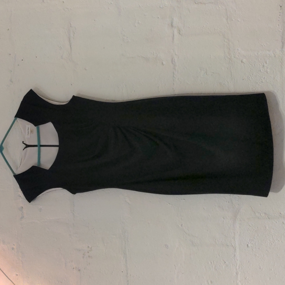 Black Calvin Klein flattering dress with unique neck